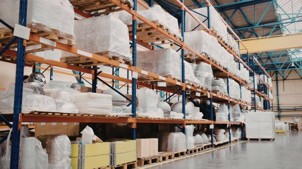 shelf with stacks of inventory in a warehouse